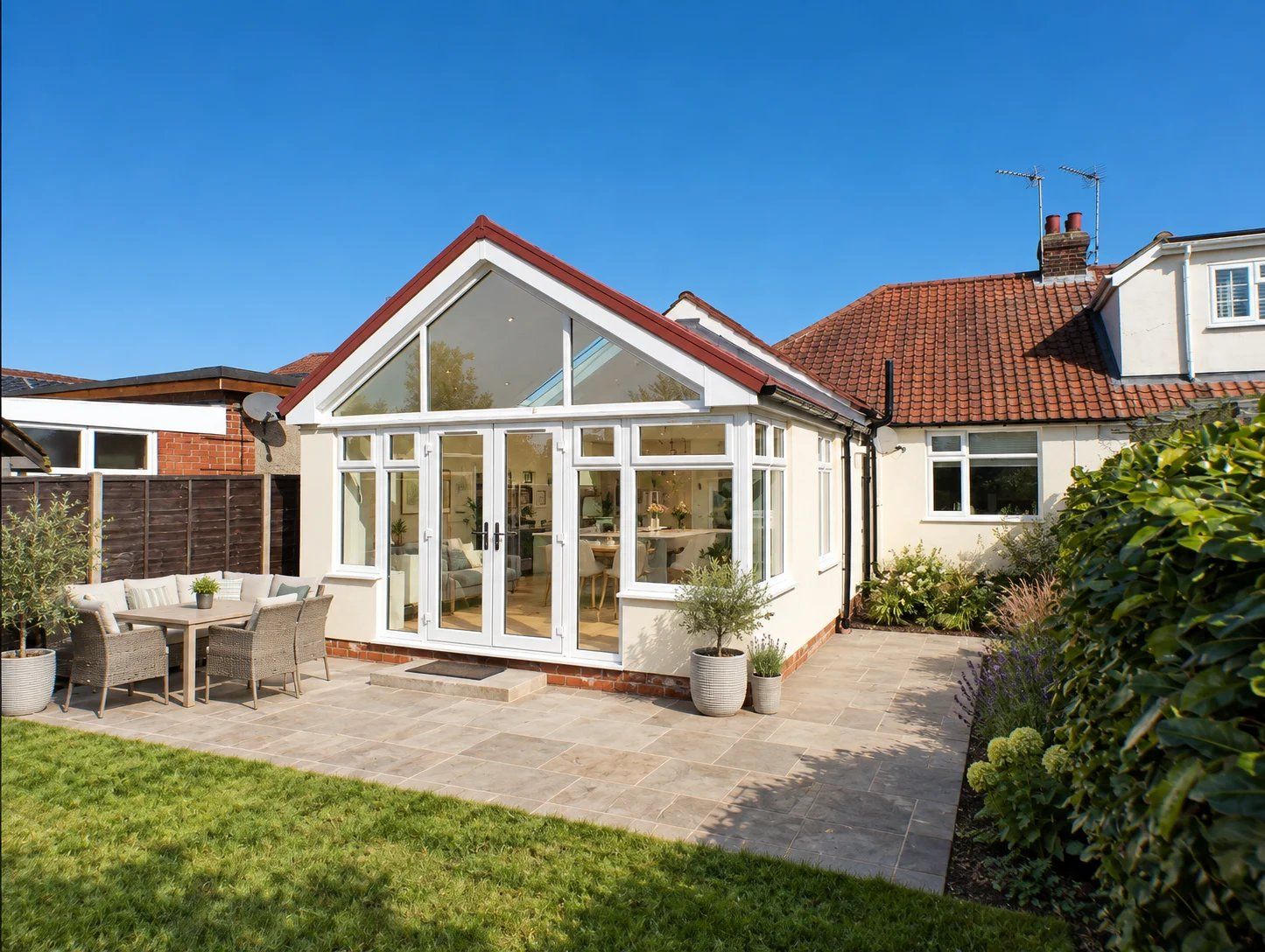 Garden room extension with French doors and a patio
